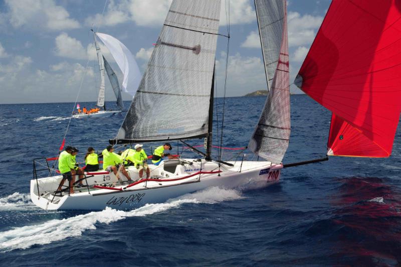 A superb day for the Melges 32s. Sergio Sagramoso's Puerto Rican Lazy Dog and Jaime Torres' Smile and Wave enjoy perfect racing conditions © Todd VanSickle/BVI Spring Regatta