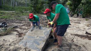 BVI Wombles beach clean digging up